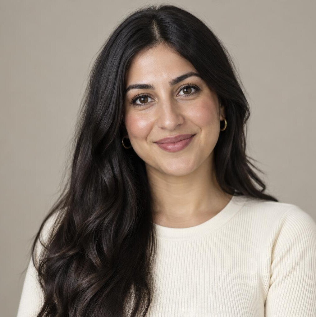 Portrait of a woman with dark hair smiling